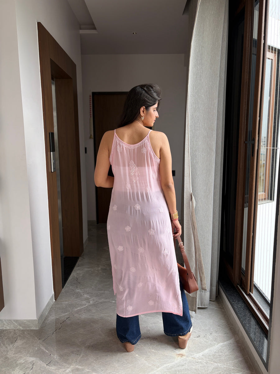 Blush pink viscose noodle strap chikankari kurta - back view with tassel handbag